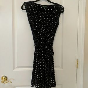 Navy polka dot faux wrap dress